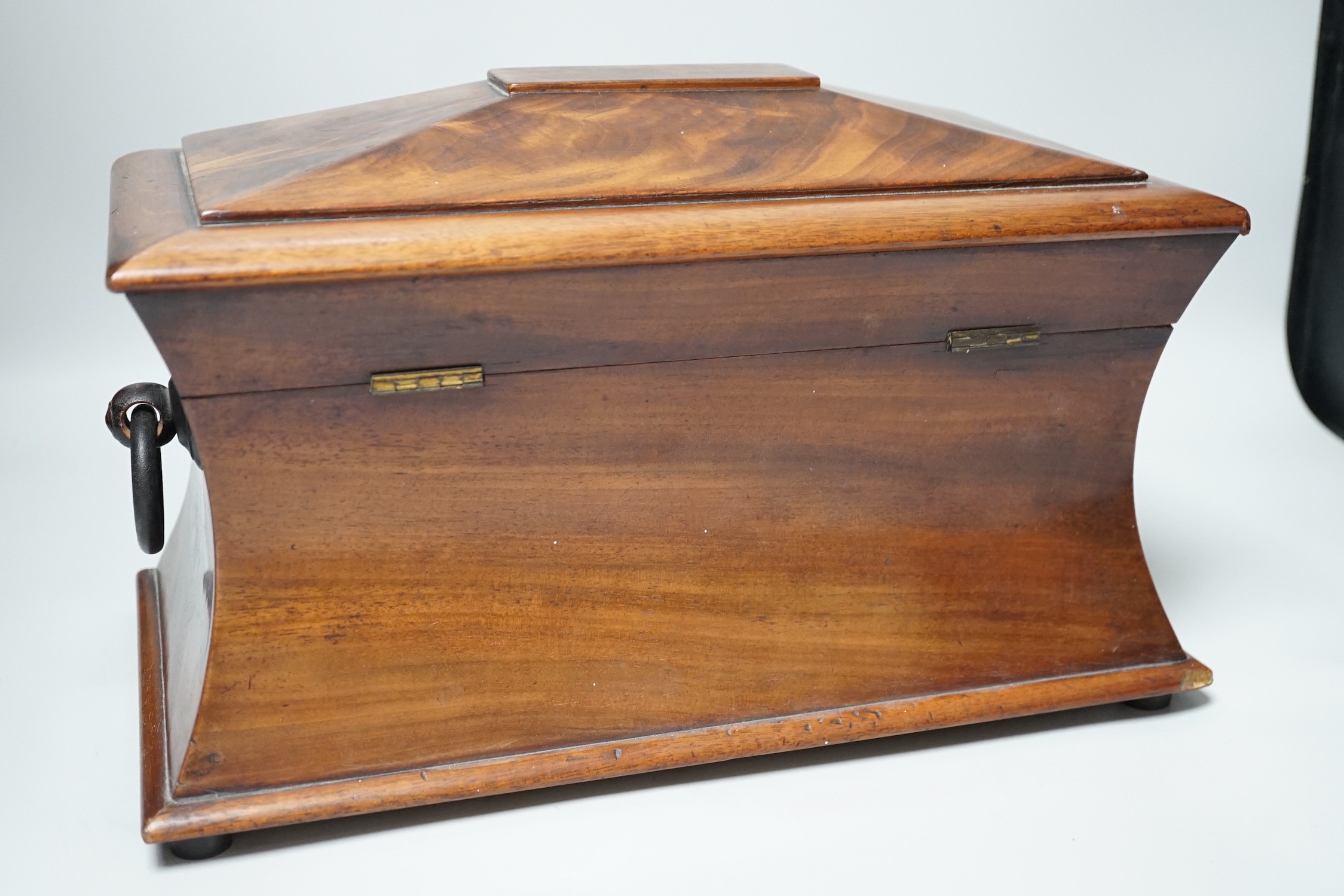 A 19th century mahogany sarcophagus shaped tea caddy, 34cm wide